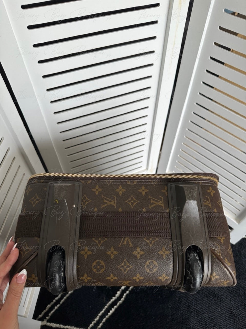 Louis Vuitton Pegase Light 55 Carry On Suitcase