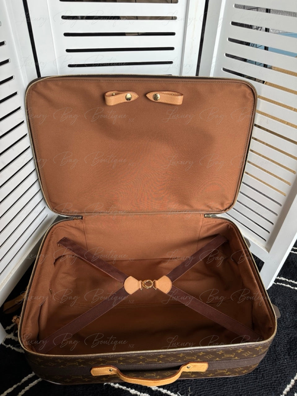 Louis Vuitton Pegase Light 55 Carry On Suitcase